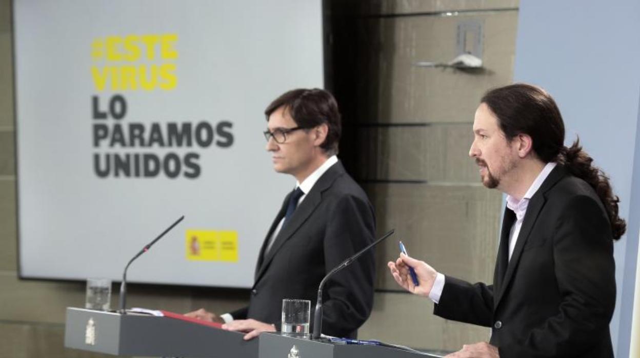 Iglesias, junto a Illa, el 19 de marzo, cuando anunció las medidas del Gobierno para paliar la situación en las residencias de ancianos