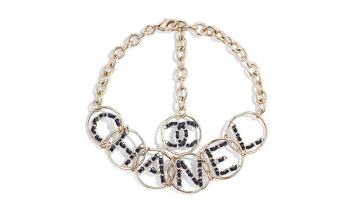 Collar en metal dorado con piel