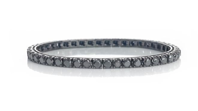 Pulsera riviere con diamantes negros engastados en garras