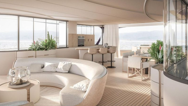 La zona exterior incluye un bar, solárium y zona de descanso con sofás