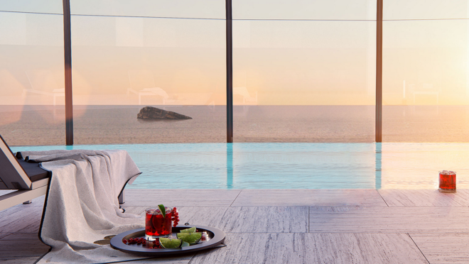 Imagen de la piscina infinity de las zonas comunes